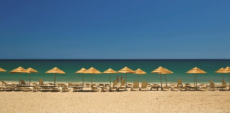 It is infuriating to arrive at the beach and find all the space taken by towels and umbrellas